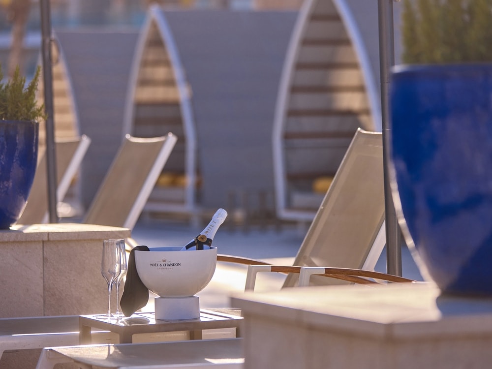 Pool and sunbathing service Pool and sunbathing service universal hotel neptuno adults only