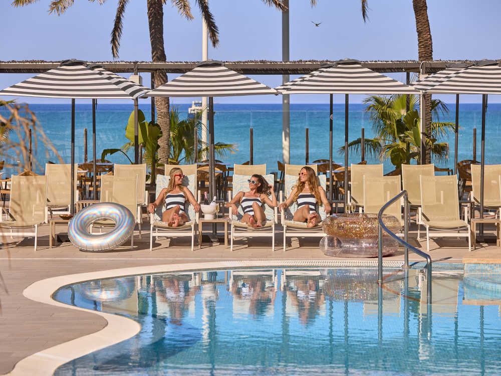 Pool and sunbathing service Pool and sunbathing service universal hotel neptuno adults only